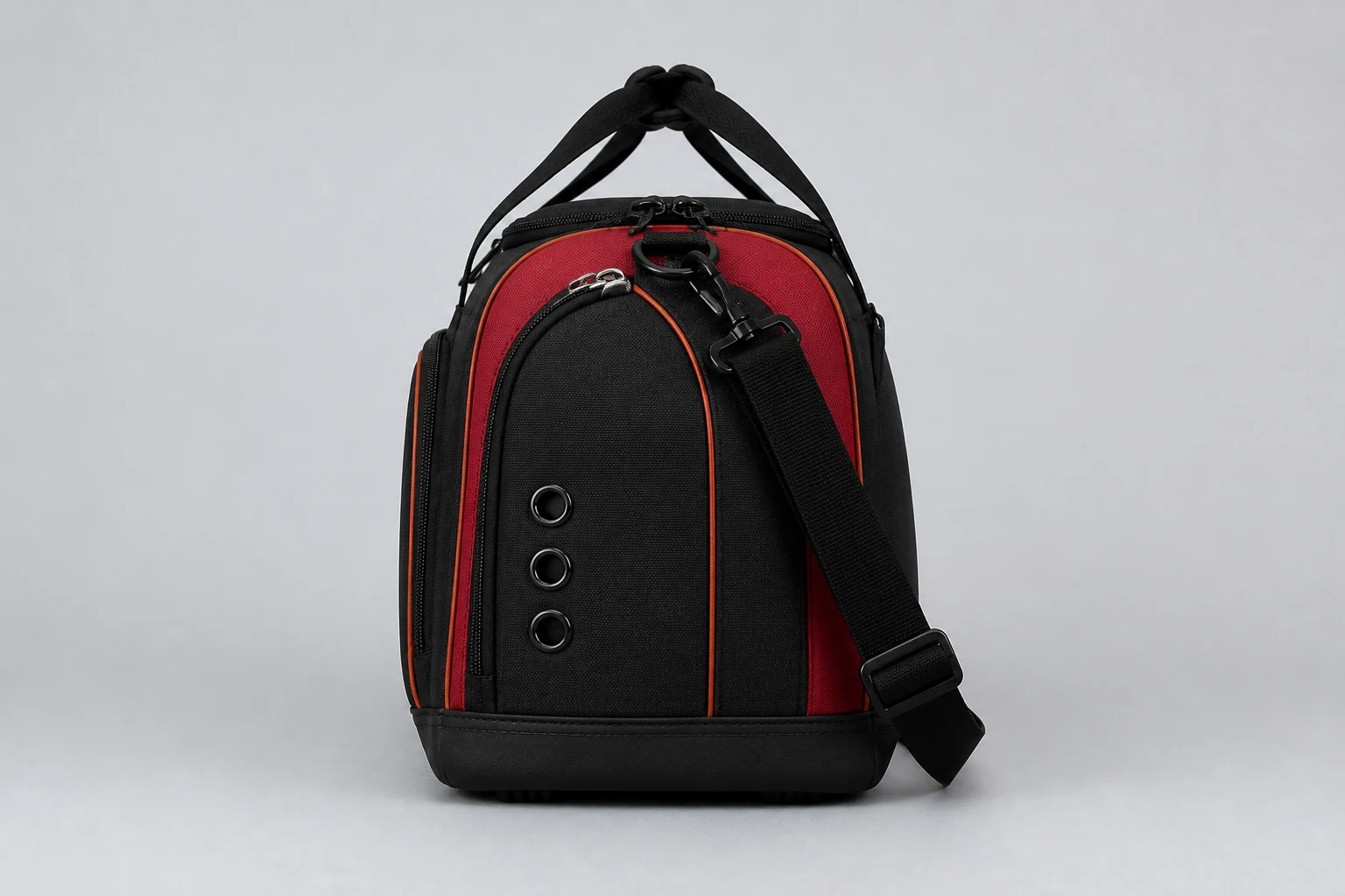 Ventilated side shoe compartment on a custom football team duffle bag