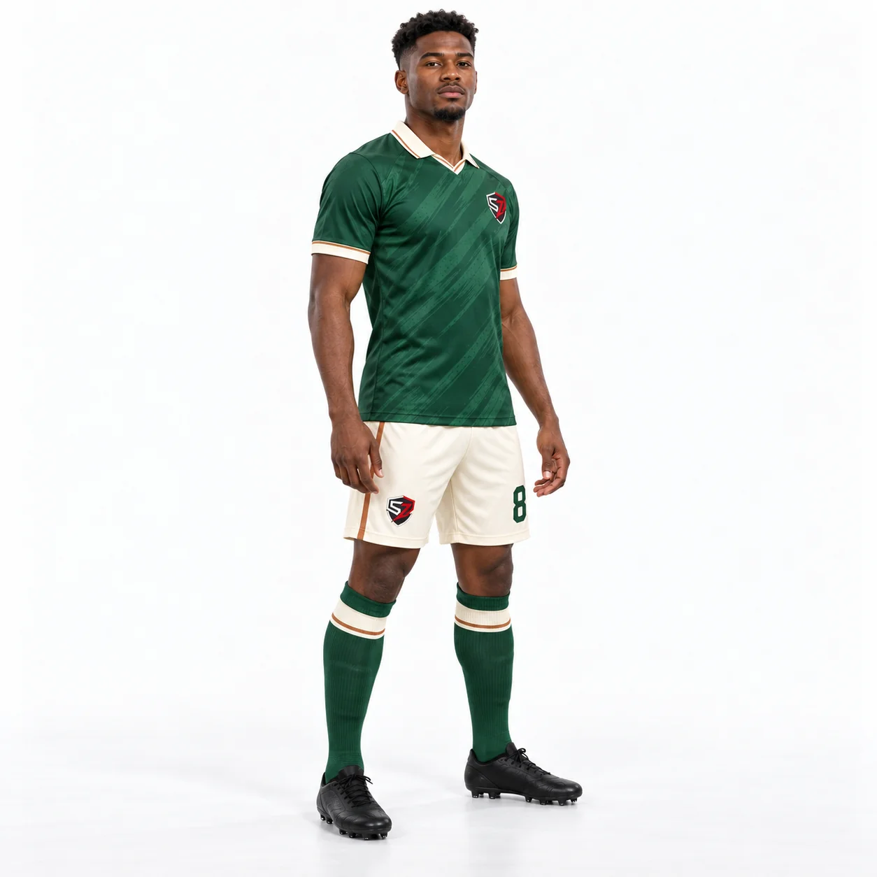 Three-quarter view of coordinated green and ivory football team kit