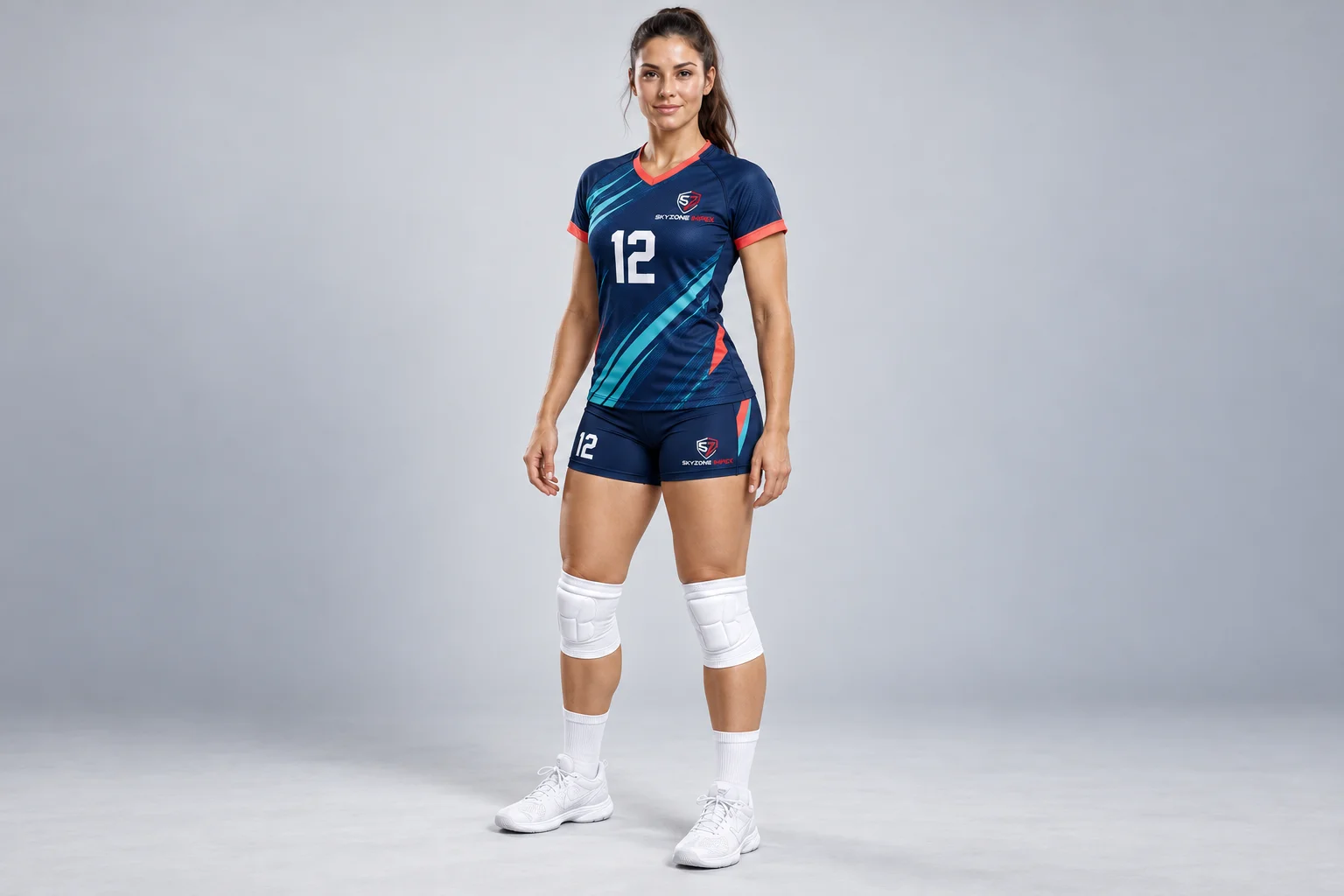Three-quarter view of a Skyzone branded custom volleyball uniform in navy turquoise and coral